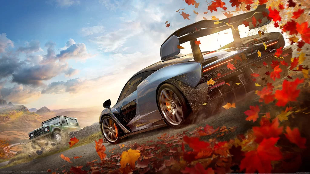 car racing autumn leaves mountain road
