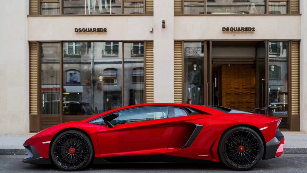 car red luxury storefront fashion brand urban lifestyle