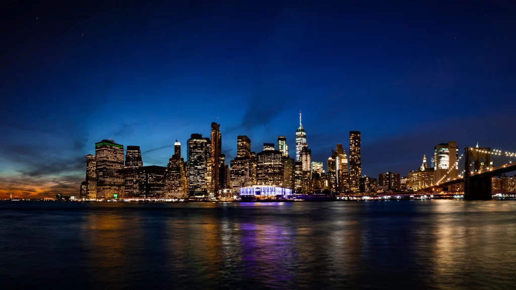 cityscape skyline night lights bridge water
