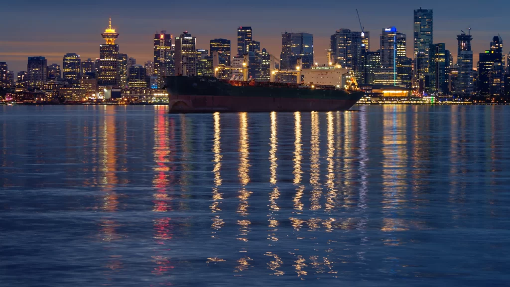 cityscape skyline water reflection ship evening
