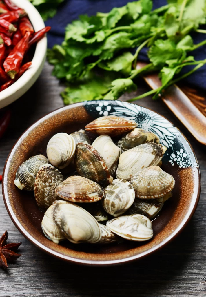 Clams Brown Shell Green Herbs Red Chilies
