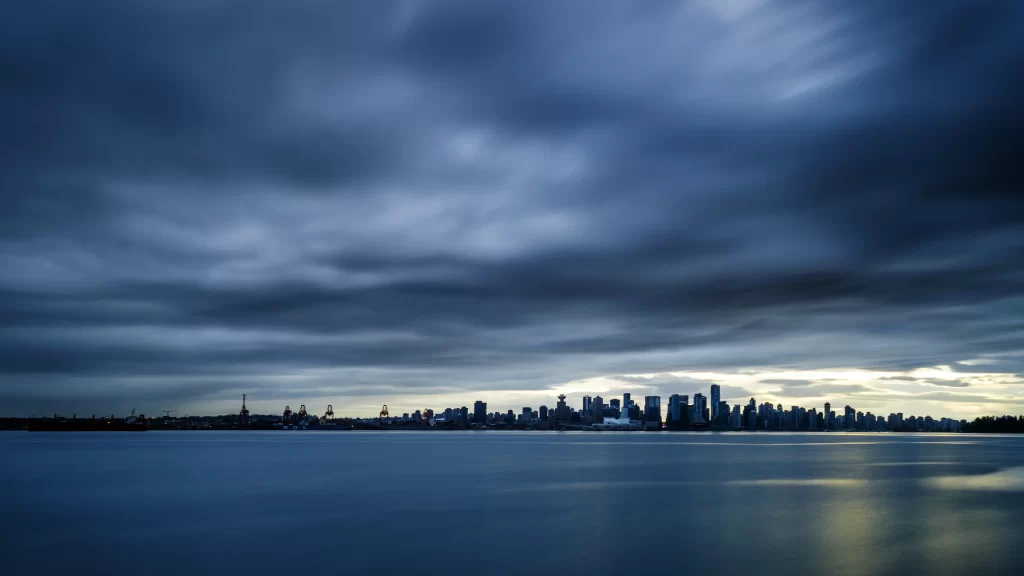cloudy cityscape water reflection skyscrapers