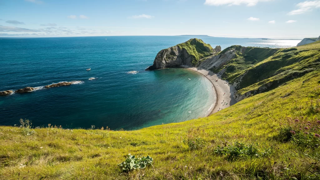 Coastal Landscape Ocean Cliffs Greenery Beach Clear Sky