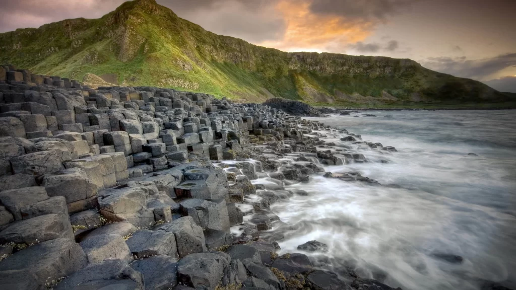 coastline basalt columns waves cliffs sunset landscape