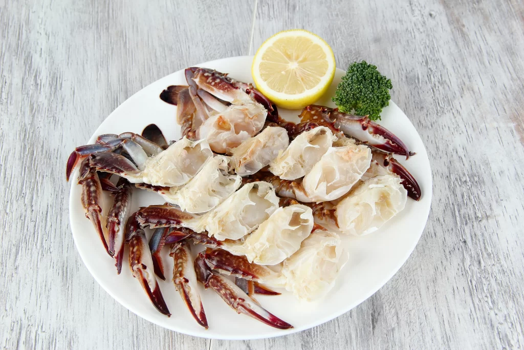 Crab Legs White Plate Lemon Garnish
