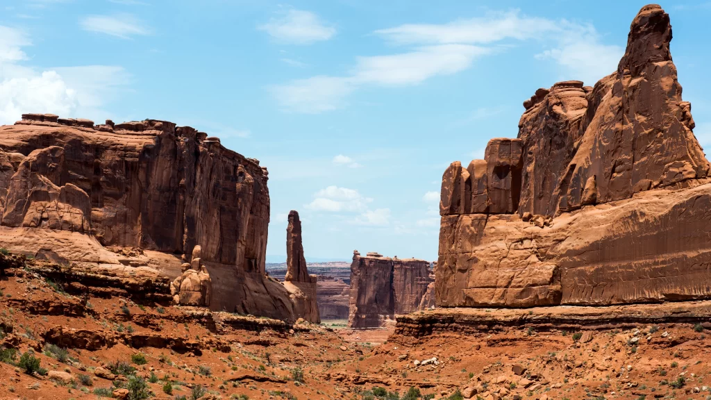 desert rock formations blue sky sandstone canyon