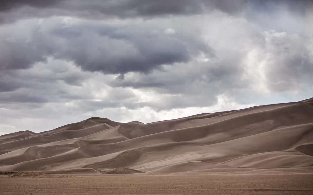 desert sand dunes cloudy sky