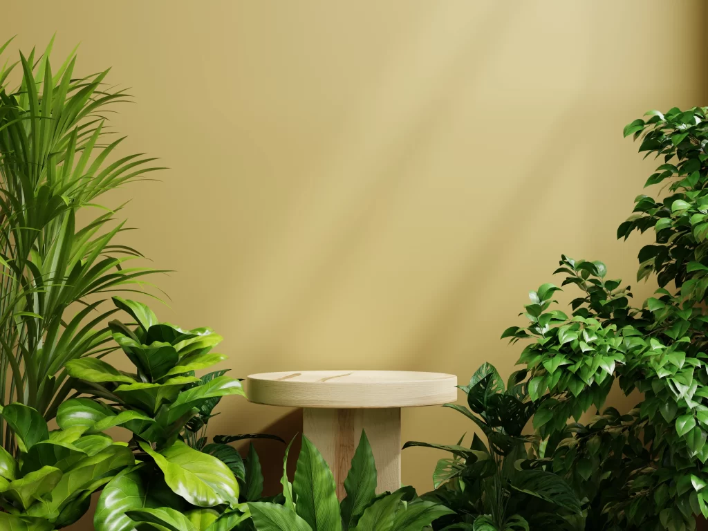 Empty Wooden Pedestal Mockup Surrounded by Lush Tropical Plants