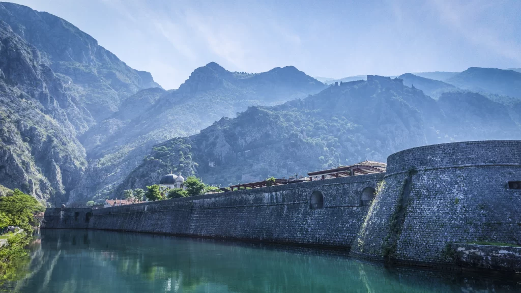 fortress mountains river reflection architecture nature