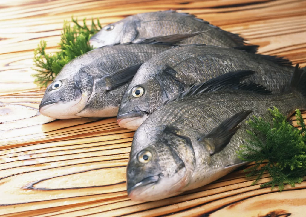 Fresh Fish Silver Scales Green Herbs Wooden Surface