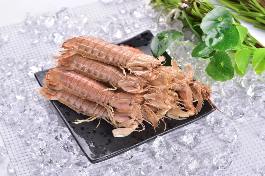 Fresh Lobster Brown Shell Ice Crystals Green Leaves