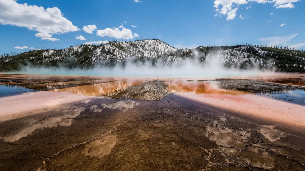 geothermal steam landscape mountain blue sky
