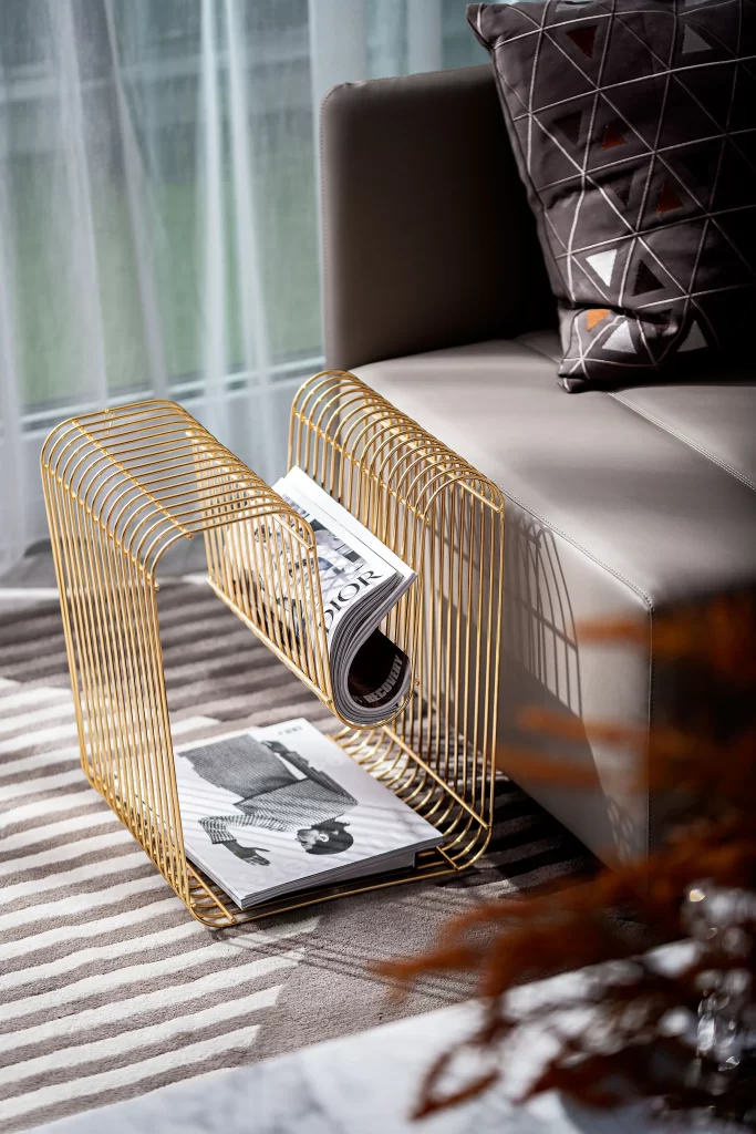 Gold Magazine Rack Contemporary Design Neutral Color Palette Comfortable Seating Area