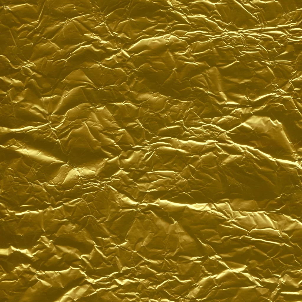 Golden Crumpled Foil Paper Background