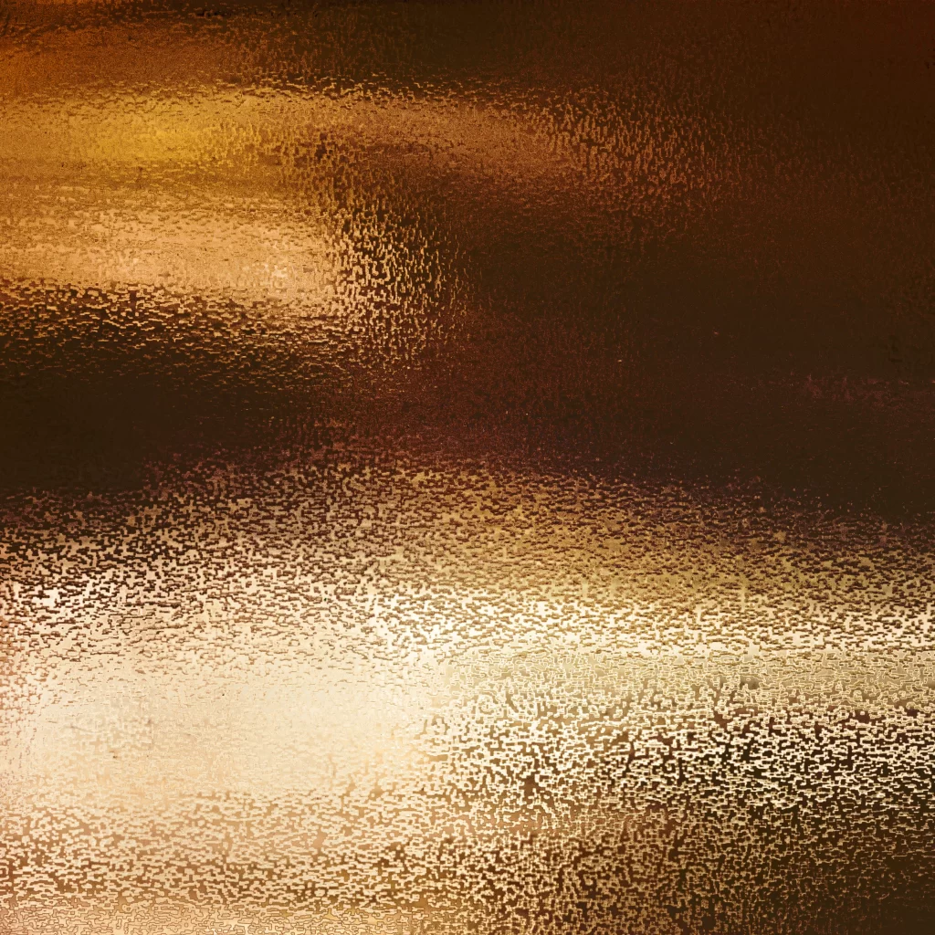 Golden Granular Textured Metallic Bronze Surface