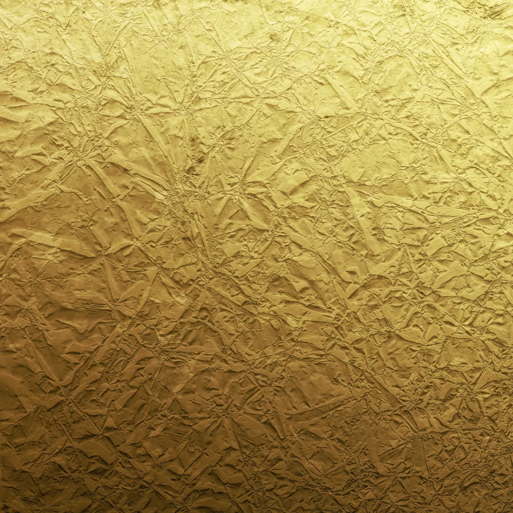 Golden Wrinkled Metallic Foil Surface