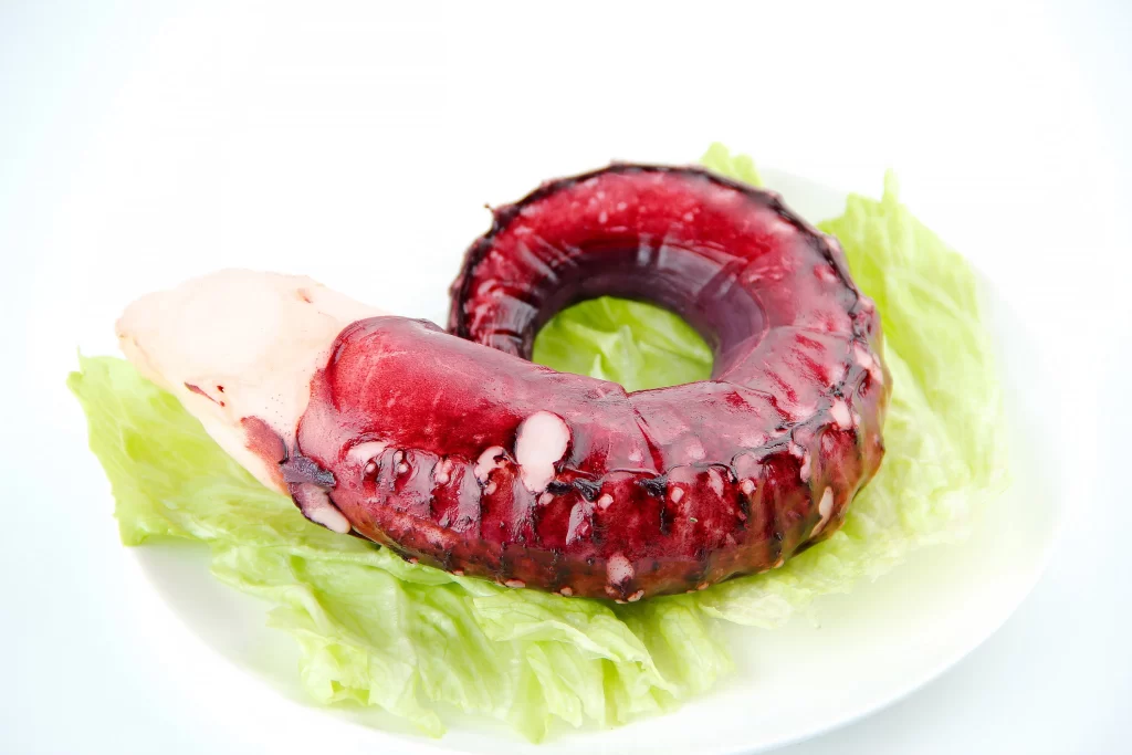 Grilled Octopus Tentacle Reddish-brown Color Green Lettuce