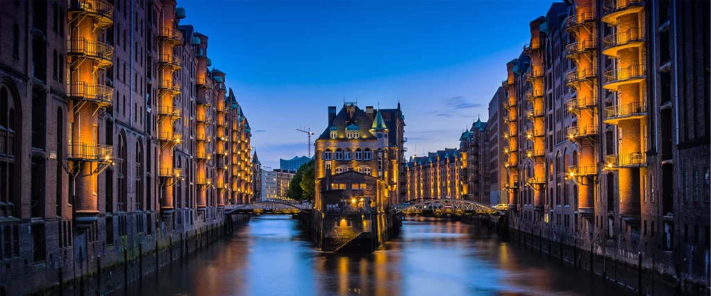 Historic buildings river twilight lights architecture bridge