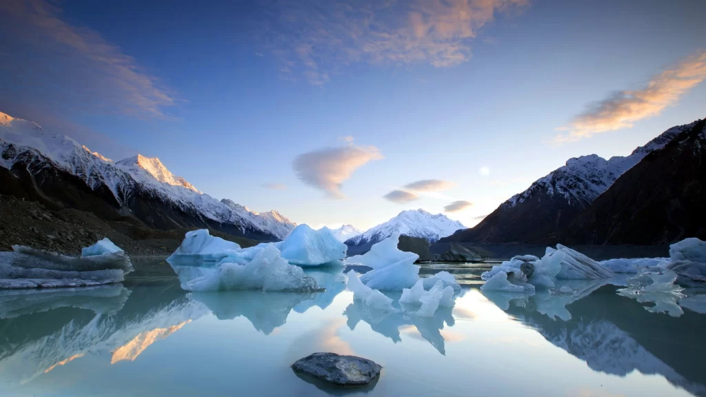 ice mountains reflection sky clouds sunrise