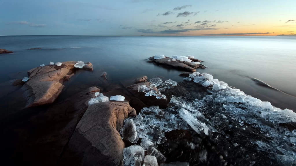 ice water rocks sunset horizon clouds