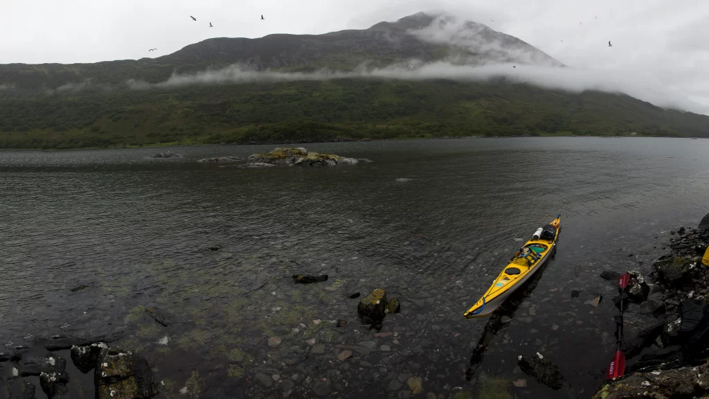 kayak lake mountain fog paddle nature