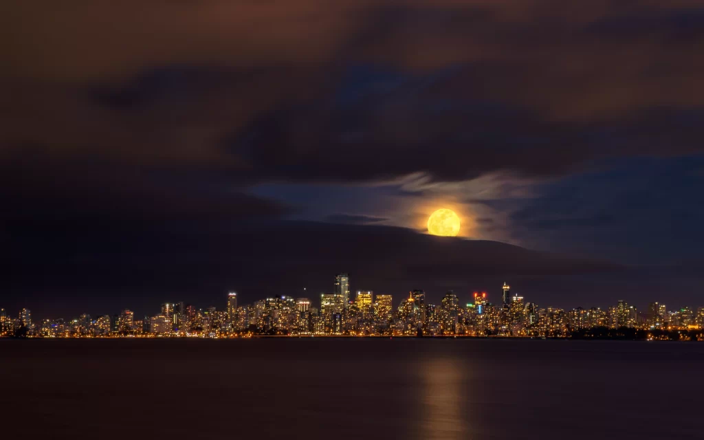 Moonlit Cityscape Illuminated Buildings Cloudy Sky Reflection