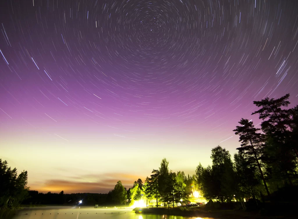 Starry Night Sky Star Trails Purple Haze Trees Lake