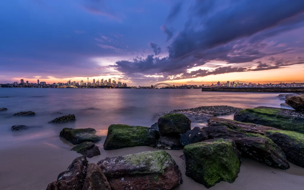 Sunset Cityscape Bridge Water Rocks