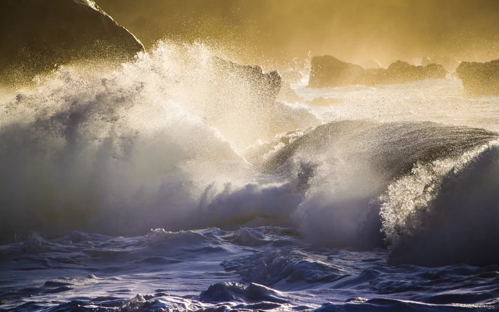 Ocean Waves Rocky Shore Sunlight Splashing Water