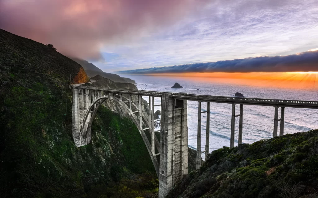 Sunset Bridge Ocean Waves Rocky Coastline Scenic