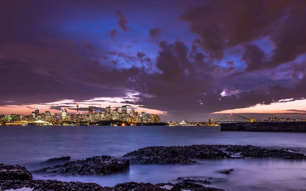 Twilight Cityscape Bridge Water Rocks