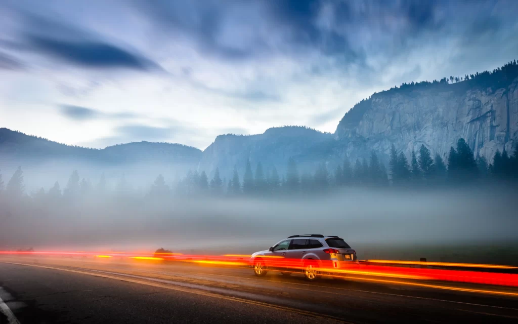 Foggy Mountain Road Car Light Trails Twilight