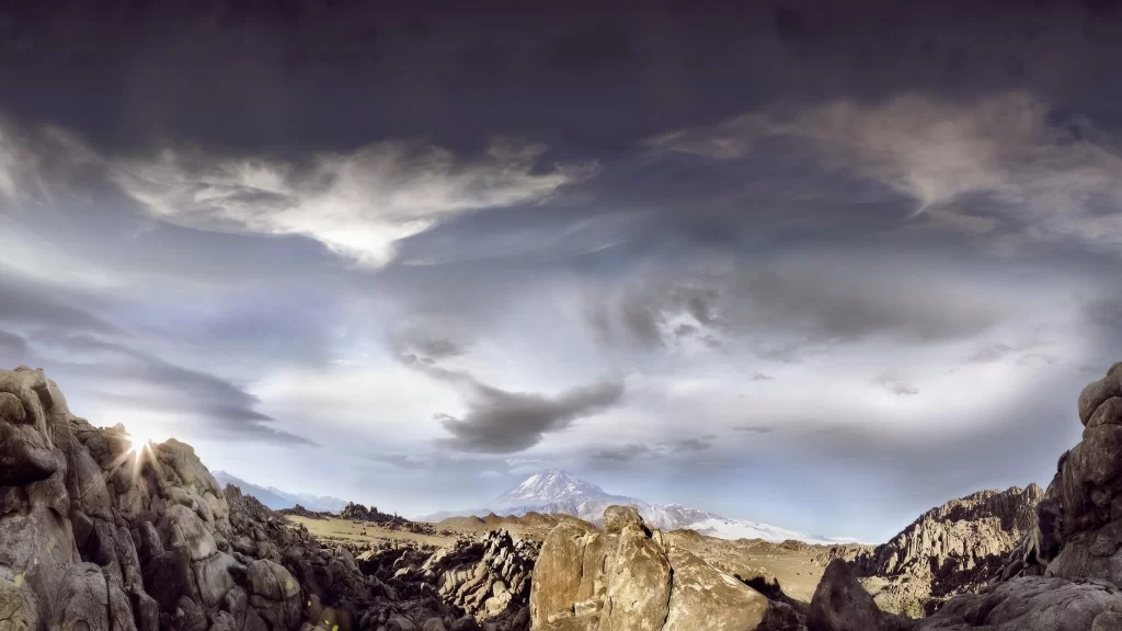 landscape clouds mountains sunlight rocks sky