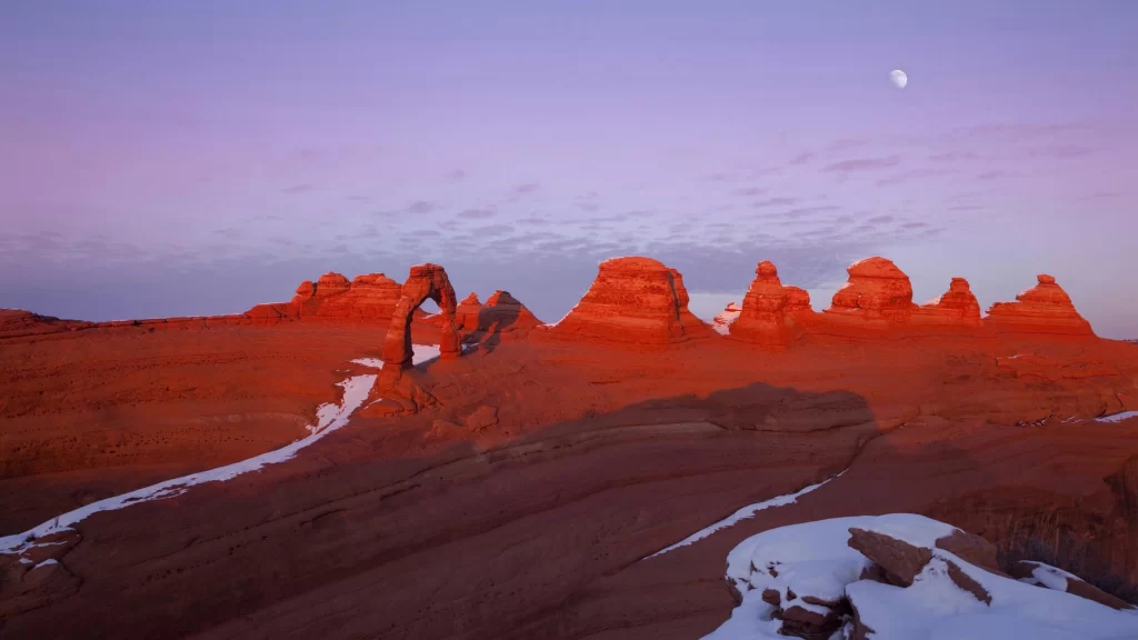 landscape desert rock formations sky moon snow