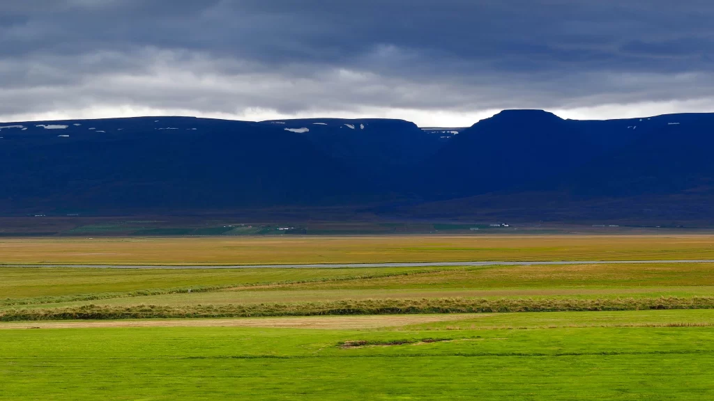 landscape grassland mountains sky clouds natural