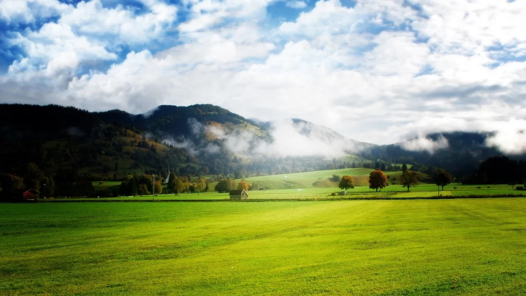 landscape nature green field trees mountains