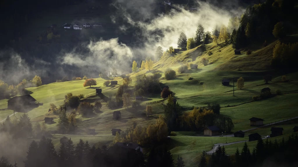 landscape nature trees fog hills houses