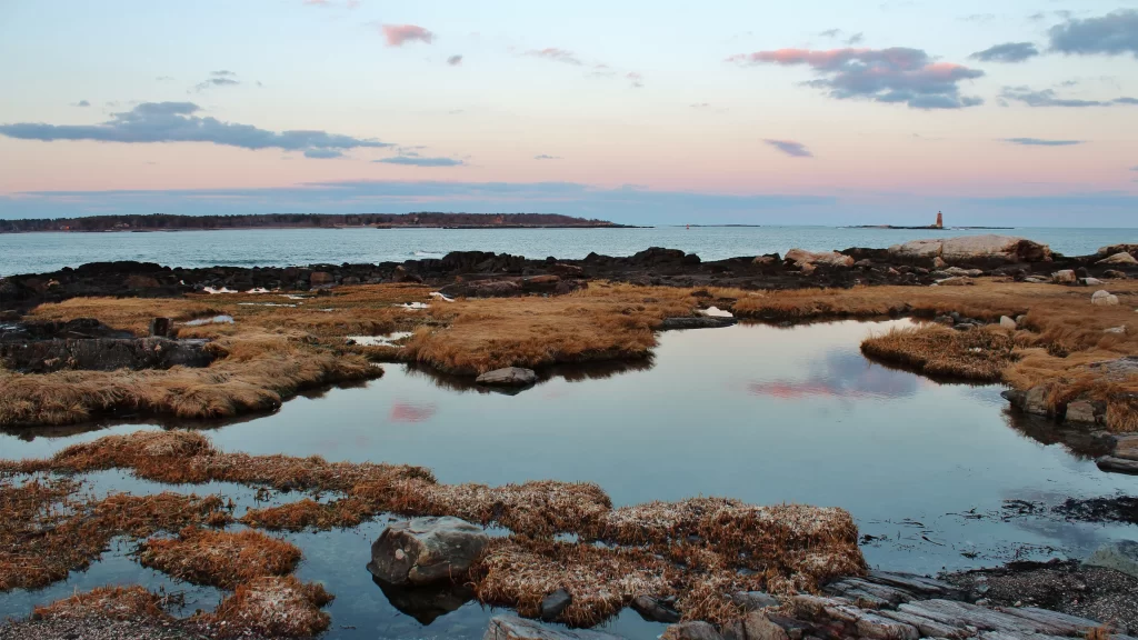 landscape water sky sunset clouds rocks