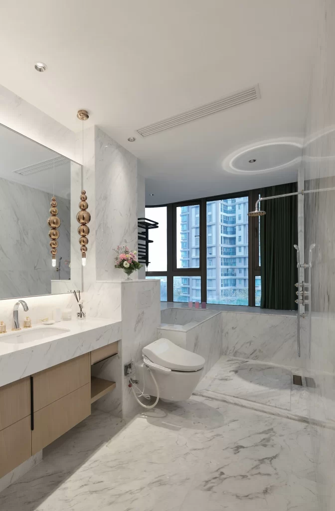Luxury Bathroom Marble Walls Neutral Tones Glass Shower Modern Fixtures