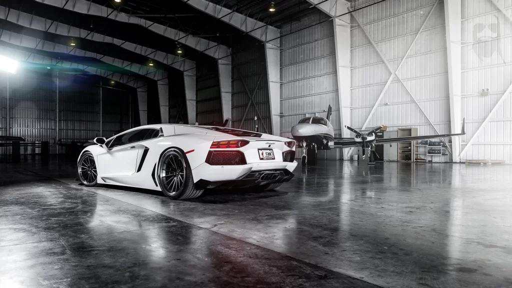 luxury car white sports car aircraft hangar airplane polished floor