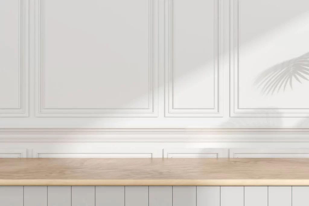 Minimalist Interior Mockup with Light Wood Countertop and Palm Shadow