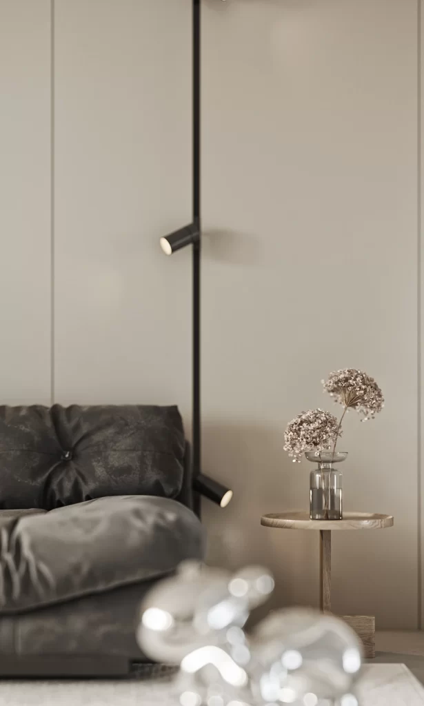 Minimalist Living Room Dark Sofa Wooden Table Decorative Flowers Wall Lamp
