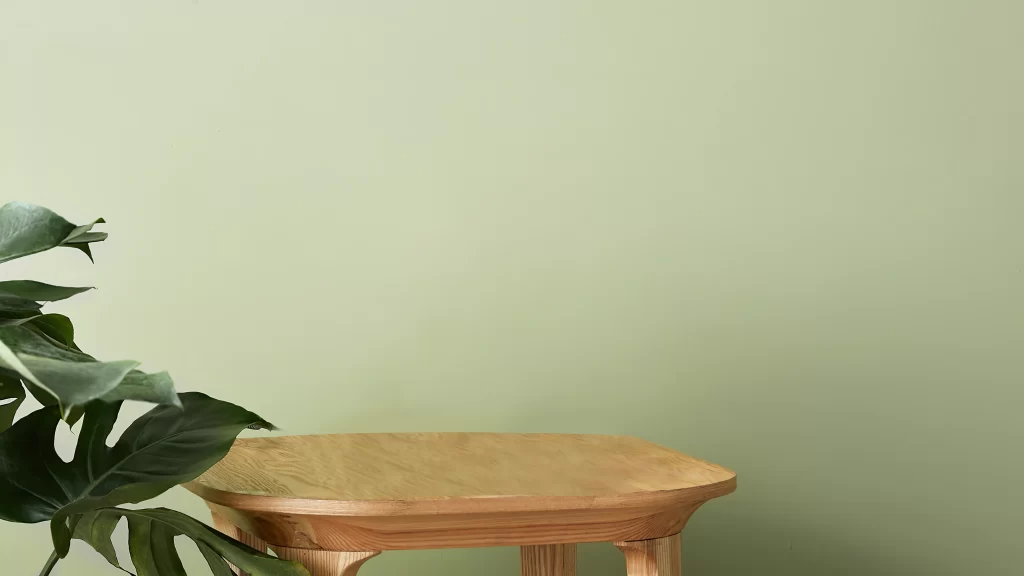 Minimalist Wooden Table Mockup with Monstera Plant