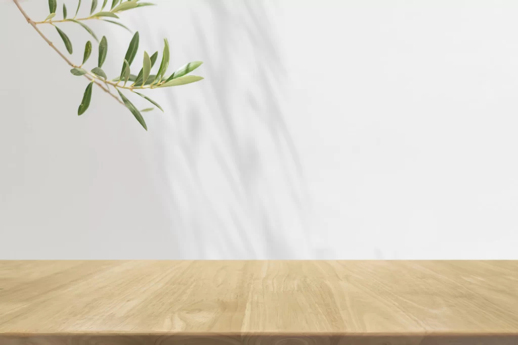 Minimalist Wooden Table Mockup with Olive Branch
