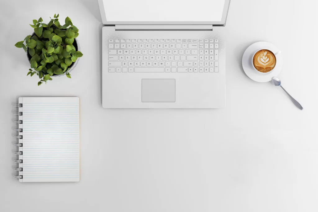 Minimalist Workspace Flat Lay with Laptop and Coffee