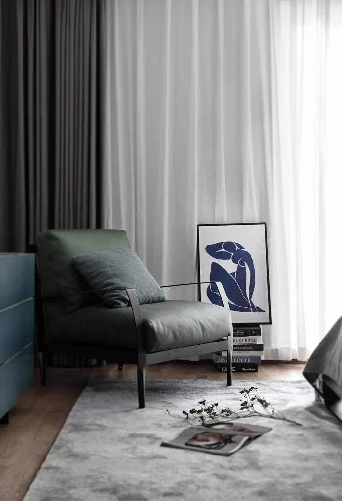 Modern Bedroom Neutral Tones Minimalist Chair Blue Accents Artistic Decor