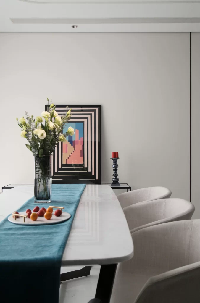 Modern Dining Room White Table Blue Runner Minimalist Chairs Abstract Art