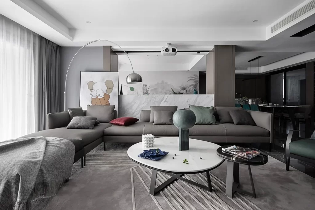 Modern Living Room Neutral Tones Minimalist Sofa Round Coffee Table Artistic Decor