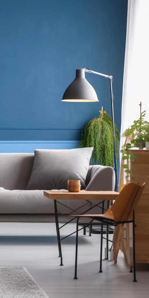 Modern Living Room with Blue Wall and Industrial Lamp