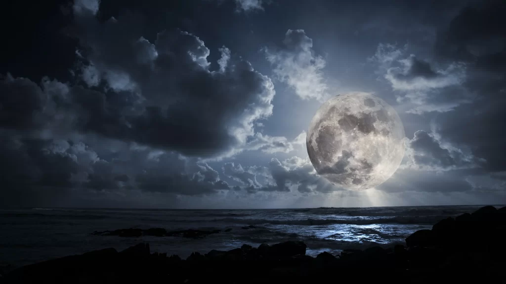 moon clouds ocean night sky reflection waves horizon